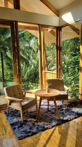 Ruang duduk di Remote Home near Secret Lagoon with Motorcycle