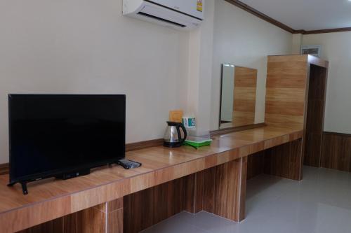 TV a/nebo společenská místnost v ubytování TJ Garden & Resort