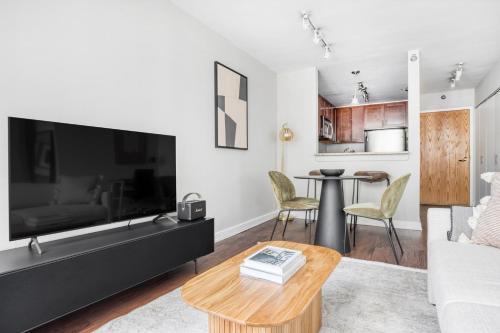 A television and/or entertainment centre at Streeterville Studio w Dog Run Deck nr Park CHI-584