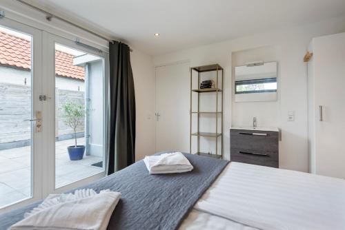 Postel nebo postele na pokoji v ubytování Amsterdam Dunes Holiday Home