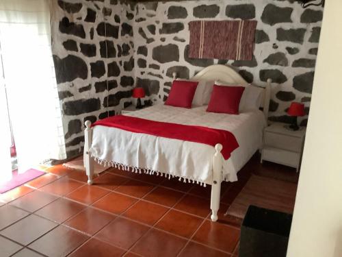 Tempat tidur dalam kamar di Adega do Pesqueiro Alto
