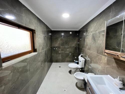 Koupelna v ubytování HOTEL FLAVIA