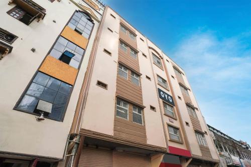 an apartment building in the city of london at Hotel Aroma Classic Near Nampally Main Railway station in Hyderabad