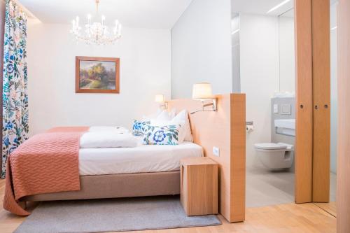 Postel nebo postele na pokoji v ubytování Hotel Wolf
