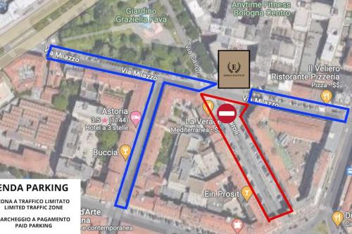 a map of a parking lot with a red arrow at [Via Indipendenza] – Attico di lusso con Piscina in Bologna