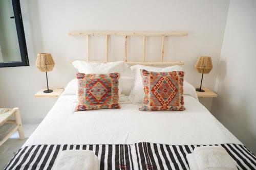 Ένα ή περισσότερα κρεβάτια σε δωμάτιο στο San Diego Cathedral Sevilla II