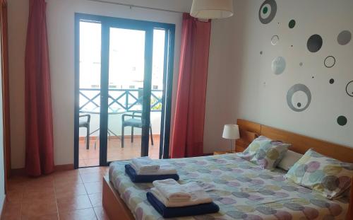 Postel nebo postele na pokoji v ubytování Villa Lanzarote