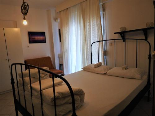 מיטה או מיטות בחדר ב-Konstantinos's Luxury Studio