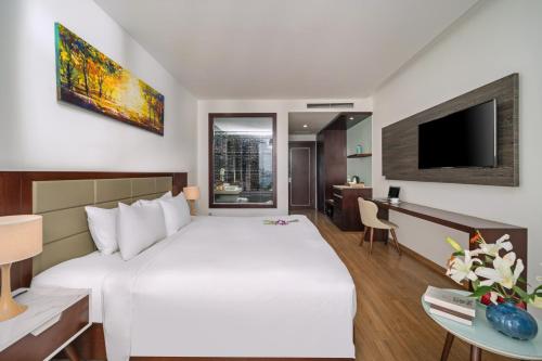 TV a/nebo společenská místnost v ubytování Aria Grand Hotel & Spa