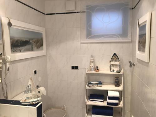 Ένα μπάνιο στο Ferienwohnung An der Therme