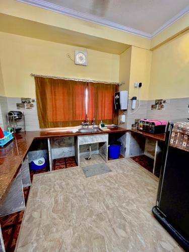 Η κουζίνα ή μικρή κουζίνα στο Beena Homestay