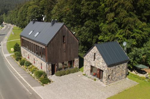 an overhead view of a house with a roof at Krakonošova Dílna "WOODHAUS" in Špindlerův Mlýn
