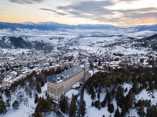 an aerial view of a city in the snow at Appartement T2 Font Romeu in Font Romeu Odeillo Via