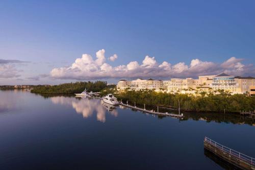 a view of a large body of water with buildings at Wyndham Grand Jupiter at Harbourside Place in Jupiter