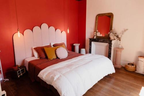 Cama o camas de una habitación en Maison avec jacuzzi
