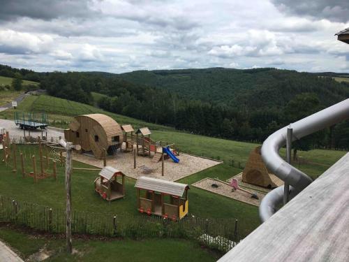 a view of a playground with a play equipment at La Casa Kemtio in Nollevaux