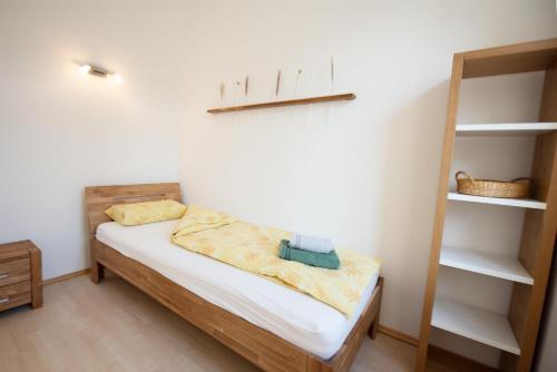 Posteľ alebo postele v izbe v ubytovaní Kiwi Apartment Vienna