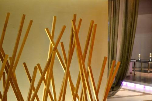 a bunch of wooden sticks on a wall at Evridiki in Kilkís