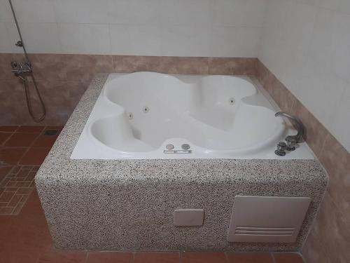 Ένα μπάνιο στο Xinghe Motel - Chaozhou