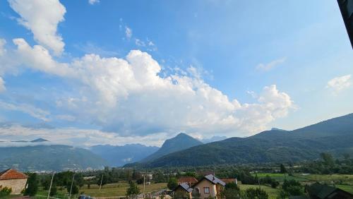 a view of a valley with mountains in the background at Peaks of Prokletije - Outdoor pool in Gusinje