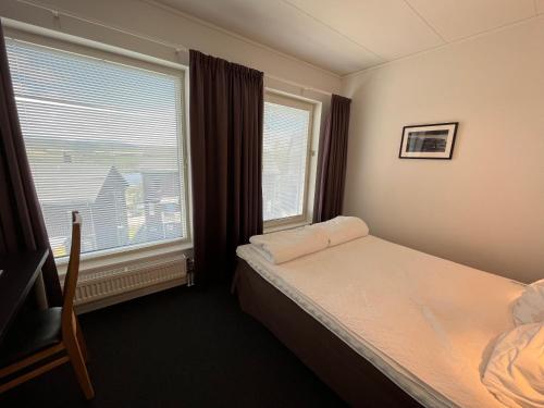 Letto o letti in una camera di Ski Lodge Funäsdalen