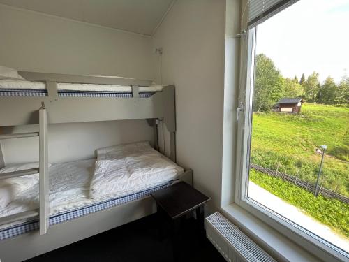 Letto o letti in una camera di Ski Lodge Funäsdalen