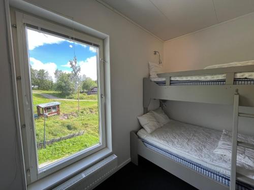 Postel nebo postele na pokoji v ubytování Ski Lodge Funäsdalen