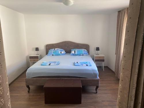 Postel nebo postele na pokoji v ubytování VIKI apartman