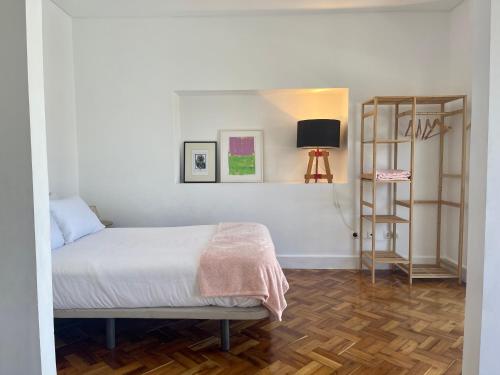 Кровать или кровати в номере Casa Amiluz