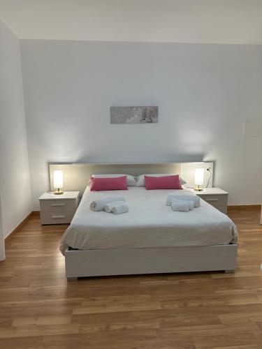 Ένα ή περισσότερα κρεβάτια σε δωμάτιο στο BnB Nuova Vita