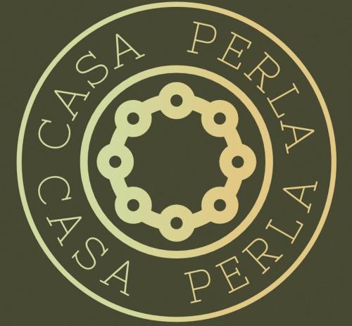 a gold coin with the text sea persepolis at Casa PERLA in Dunajská Streda