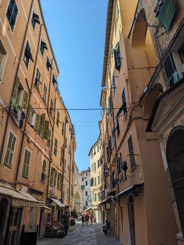 an alley in a city with buildings at Casa Moret in Sanremo