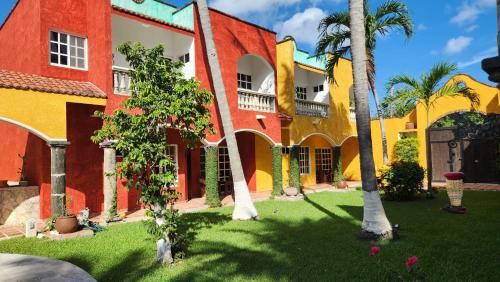 Κήπος έξω από το Casa Colonial, Cozumel Villa Guava