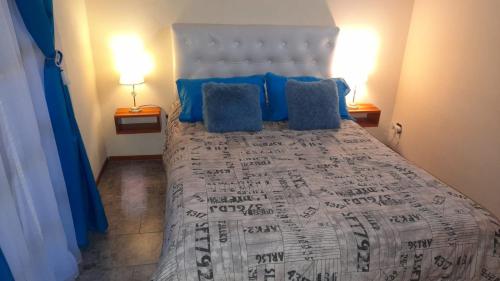 Un pat sau paturi într-o cameră la DelMar