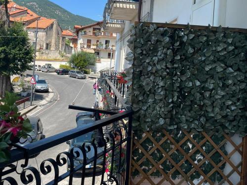 a building with a rock wall on the side of it at Il Borgo in Agerola