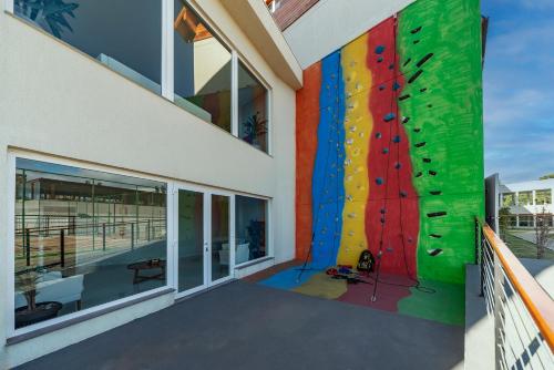 an indoor rock climbing wall in a building at Laghetto Resort Golden Oficial in Gramado