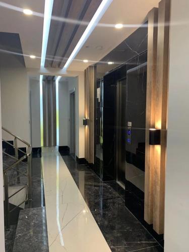 a hallway of a building with a elevator at Antalya centre in Antalya