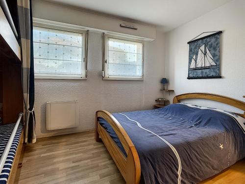 Postel nebo postele na pokoji v ubytování résidence du soleil