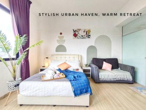 a small bedroom with a bed and a couch at Urban-Nature Retreat Encorp Strand Alpha IVF 3px in Petaling Jaya