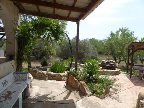 Zahrada ubytování Mas Blauet - Finca with 2 holiday houses and shared pool