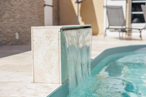 a close up of a swimming pool at La maison des vignes in Saint-Pierre-de-Bat