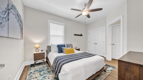 a bedroom with a bed and a ceiling fan at Hidden Lake Condos 113 - Short walk to the beach along Scenic Hwy 30A in Santa Rosa Beach in Santa Rosa Beach