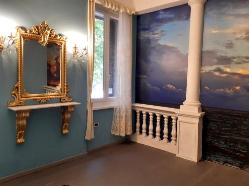 トリエステにあるAffittacamere Girasoleの空絵付きの部屋