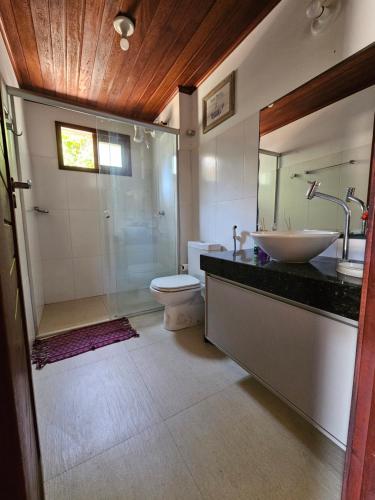 a bathroom with a sink and a toilet and a shower at Bangalôs da Barra 10 - Praia de Barra Grande - Piauí in Barra Grande