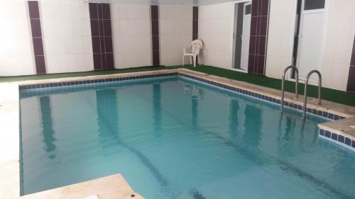 Kolam renang di atau dekat dengan Uyum Hotel