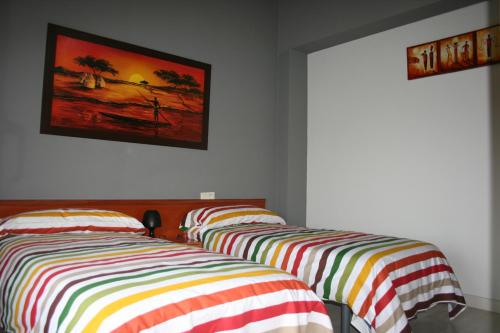 Cama o camas de una habitación en Vivienda Turistica Rural Piskerra