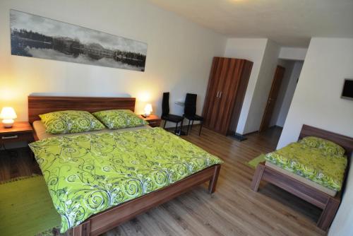 Postel nebo postele na pokoji v ubytování Villa Gold