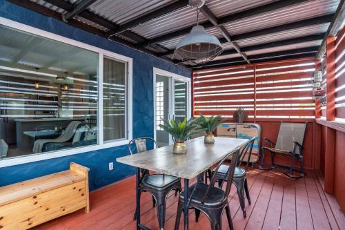 a dining room with a table and some chairs at PORCHLIGHT HOME Central San Diego FREE parking in San Diego