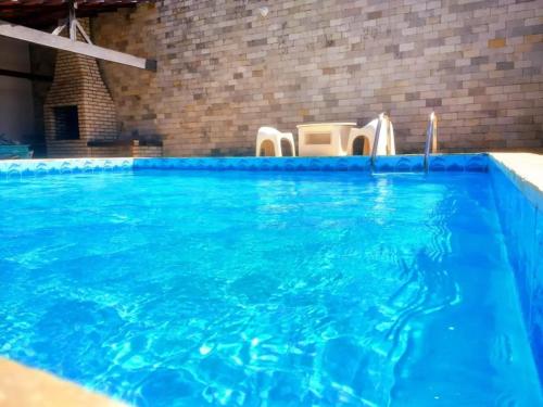 The swimming pool at or close to CASA CAMPESTRE COM PISCINA
