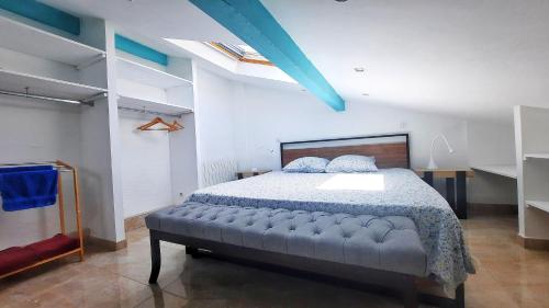 a bedroom with a large bed in a room at Bed & Breakfast L'Etape Basque in Bidart